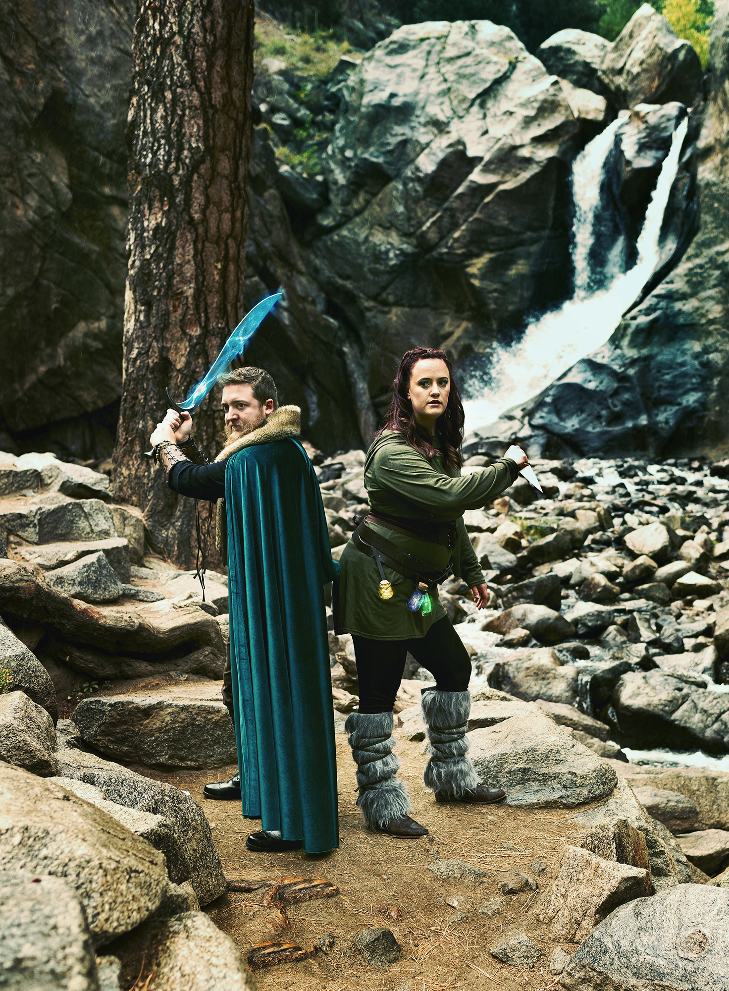 A man and woman pose in Lord of the Rings Inspired Costumes for a fantasy photo shoot in Boulder Colorado by Kendra Colleen Photography. 